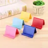 Soporte de escritorio perezoso para teléfono, soporte universal de color caramelo para teléfono y tableta, soporte de teléfono compacto y portátil