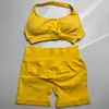 En Stock Dfyne Mismo Estilo Conjunto de Yoga de Alta Elasticidad Sujetador Halter y Conjunto de Shorts Conjunto de Yoga Fitness sin Costuras