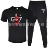 Moda de Comércio Exterior Camiseta Masculina de Manga Curta Calça Terno Casual Gola Redonda Cor Lisa Estampa de Letras Roupa Esportiva Casual