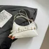 Bolsa de Axila Retrô de Alta Qualidade Transfronteiriça para Mulheres 2025 Nova Bolsa Tote Simples para o Dia a Dia Bolsa de Ombro Versátil Transversal
