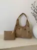 2026 Nova Bolsa Transversal de Ombro Único Feminina de Grande Capacidade Vazada para Axila Bolsa Tote de Alta Qualidade Retrô da Moda Feminina