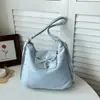 Mochila casual de grande capacidade para mulheres, novo modelo 2026, bolsa de ombro para o dia a dia com estampa de estrelas, bolsa transversal moderna e simples