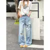 Jeans de Pierna Ancha Lavados Azul Claro de Moda High Street Icciicc con Desgarros Irregulares y Diseño Largo Hasta el Suelo para Verano 10874