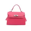 Otoño 2026 Nuevo Bolso Kelly Bolso de Mano Fresco de Gama Alta Bolso Cruzado para Mujer Sentido de Gama Alta Bolso de Diseño de Nicho bolsos