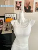88043 # Estilo Nuevo Primavera/Verano Camisola de Belleza Espalda Hueca Falsa de Dos Piezas con Espalda de Color Contrastante y Almohadillas Fijas para Ropa Exterior