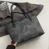 Bestseller transfronterizo: estilo casual, color block, bolsa tote de gran capacidad, bolso de hombro versátil y lindo con relieve para estudiantes