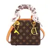 Bolsa Princesa Diana Vintage de Alta Qualidade para Mulheres 2026 Novo Modelo Bolsa de Ombro Transversal com Textura Versátil e Bolsa de Mão Elegante Estampada