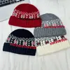 Gorro de punto con dobladillo de copo de nieve de cuatro colores para niños 2025 Nuevo Ambiente Retro Gorro de lana tejido jacquard para bebé niño