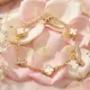 Pulsera de Trébol de Cuatro Hojas de Cinco Pétalos Mini Versión Alta Moda Exquisita Sensación de Alta Gama Trébol de Cuatro Hojas Incrustado con Diamantes Pulsera de Madreperla Blanca para Mujer