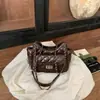 Bolso de Hombro de Moda Tendencia para Mujer 2026 Nuevo Verano Nicho Simple Gama Alta Versátil Casual para el Trabajo Bolso Cruzado