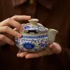 Tetera Azul y Blanca Cerámica Dehua Lujo Accesible Gama Alta Tetera Individual Estilo Chino Retro Pie Abierto Tetera de Mano Juego de Té Kung Fu