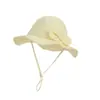 Sombrero de cuenca con visera solar para niños de primavera y verano, sombrero de pescador suave y lindo con lazo, sombrero de algodón de color liso en forma de cúpula para el sol, sombrero protector solar para niñas