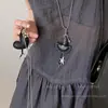 Collar Colgante de Corazón y Cruz de Cuero Maillard Cadena Larga con Borla para Suéter Diseño Dulce y Fresco Cadena para el Cuello
