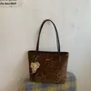 Bolso de leopardo de alta gama transfronterizo para mujer 2026 Nuevo Retro Gran Capacidad para Viajes Diarios Bolso de Hombro Único Bolso Tote Simple de Moda