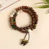 Fabricantes fornecem pulseira de cerâmica de liga novo estilo chinês feito à mão versátil estilo nacional pulseira de cerâmica de círculo duplo estilo étnico minoritário