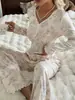Novo Conjunto de Pijama Feminino Estilo Europeu e Americano Transfronteiriço, Moda Casual Canelada com Mangas Longas e Calças Longas com Bordas Dobradas e Tecido de Toque Gelado, Conjunto para Usar em Casa