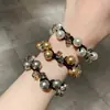 Nueva Pulsera de Perlas Cuerda para el Cabello Elegante para Mujer Todo-partido Cuerda para la Cabeza Bola de Payon de Grado Superior Banda de Goma Accesorios para el Cabello para Mujeres