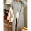 Abrigo largo de lana retro casual Dongdaemun coreano en stock con diseño de botón oculto, abertura trasera y cierre de cinturón