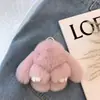Pingente de chaveiro de carro de alta qualidade feminino Coreia do Sul criativo fofo celebridade da internet ins boneca de pelúcia coelho pingente de mochila escolar