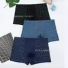 Ropa interior masculina caliente de seda de leche elástica con estampado calzoncillos modelo de mercado nocturno 5 yuanes venta al por mayor directa de fábrica