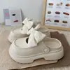 Zuecos de mujer de moda con suela gruesa 2026 sandalias de verano para exteriores de punta cerrada con lazo estilo Mary Jane