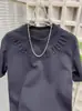 Camiseta de Manga Curta Estampada em Aço Novo Estilo Letra Popular Cor Sólida Camisa Básica Masculina Gola Redonda Estilo Coreano Peça Versátil
