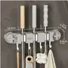 Soporte de mopa montado en la pared, gancho sin taladro, clip para balcón, baño, inodoro, estante fijo para escobas