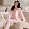 Pijama de algodón de tejido liso para mujer, disponible en stock, nuevo estilo de otoño, manga larga, pantalón largo, cárdigan, cuello redondo, ropa casual para el hogar, se puede usar afuera, dos piezas