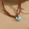 Venda Quente na Amazon Liga de Zinco Turquesa Veludo Coreano Pingente Retrô Literário Couro de Vaca Desgastado Corda Moda Colar
