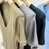 Camiseta de manga corta con cuello en V dulce y picante estilo americano para Mujer verano 2023 nuevo estilo occidental de alta calidad con hombreras top corto para mujer