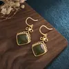 Design Criativo de Novo Estilo Ouro Antigo Jade Hetian Versátil Alto Padrão Estilo Corte Simples e Moderno Brincos e Pingentes de Orelha Femininos