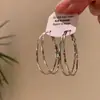 Brincos de círculo geométrico de prata estilo coreano para mulheres, brincos minimalistas de nicho de alta qualidade, brincos de argola lisos elegantes