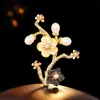 Nuevo broche de flor de ciruelo nacarado estilo chino, broche de flor de perla tradicional, venta al por mayor desde fábrica para broches de traje y abrigo