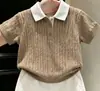 Conjunto de verano 2026 para niñas estilo coreano: top fino de punto con bloques de color en estilo vintage y cuello polo de manga corta, y falda blanca para niñas