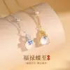 Foto real de Tiqia del Collar Mariposa de la Fortuna para mujer, plata de ley S925, nuevo estilo chino, lujo ligero, elegante colgante de calabaza de calcedonia blanca