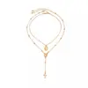 Collar vintage de disco de oro de doble capa para mujer, cadena para suéter de diseño versátil de nicho, gargantilla de lujo ligero para mujer
