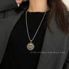 Collar de acero de titanio con cara sonriente giratoria de doble cara, unisex, estilo hip-hop, otoño e invierno, estilo celebridad de internet, cadena de lana sencilla y combinable.