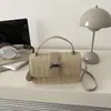 Moda Verão 2026 Nova Bolsa de Ombro Estilo Coreano Xadrez com Padrão de Pedra, Sensação de Alto Padrão, Bolsa de Mão Versátil Venda por Atacado Bolsa de Ombro