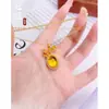 Collar de Latón Chapado en Oro con Lazo Huevo de Paloma, Lujo Ligero, Sencillo y Versátil, Cadena para Clavícula con Colgante Redondo de Princesa Fugitiva