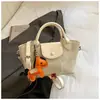 Bolso Tipo Dumpling Transfronterizo 2026 Nuevo Estilo Moda Trendy para Mujer Bolso Versátil de Hombro Cruzado Textura de Alta Calidad Bolso de Mano Pequeño