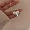 Colar Longo de Aço Titânio com Pingente de Letra Coração Estrela Prateado para Mulheres Corrente de Suéter Retrátil Versátil de Nicho de Alta Qualidade