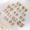 Celebridad en línea popular otoño e invierno Maillard K9 Marrón amarillo corazón torcido con forma de corazón punta inferior diamante uña zirconita decoraciones para uñas