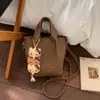 Bolsos Retro de Nicho para Mujer 2026 Nueva Moda Bolso de Mano de Alto Valor para el Trabajo Bolso Cruzado tipo Cubo