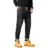 Calça jeans de sarja elástica para primavera e outono, estilo coreano slim fit, marca da moda, bordado simples, calça casual moderna e versátil para homens