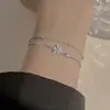 2026 Estilo Europeu de Luxo Leve Trevo de Quatro Folhas Pulseira de Camada Dupla para Mulheres Moda de Nicho Temperamento Versátil Joia de Mão Presente