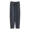 Pantalones Casuales de Punto Grueso de Lana Pura para Mujer, Otoño e Invierno 2025, Color Sólido con Costura Central y Bolsillos, Pantalones Largos de Corte Ajustado