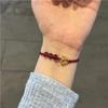 Pulsera de Amor Ojo de Gato Cristal de Fresa Dulce Pareja Cristal Nicho Tejida Cuerda de Mano Estudiante Cuerda Roja Regalo