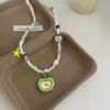 Colar Longo com Pingente de Maçã Verde 2026 para Mulheres, Design de Nicho, Versátil, Colar Infantil