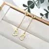 Moda Transfronteriza Acero Inoxidable Pendientes de Borla de Amor de Alta Gama para Mujer Estilo Europeo y Americano Pendientes de Diamante de Lujo Ligero Pendientes