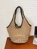 Bolsa de playa tejida casual de verano para mujer, bolsa de hombro versátil para el día a día estilo Hepburn de alta gama